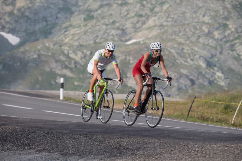 Group of cyclists at a Pyrenees mountain pass
